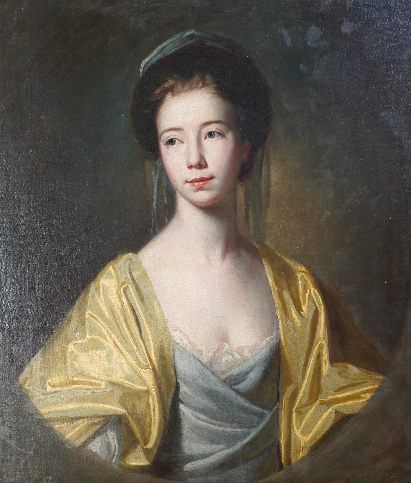 Follower of George Romney, British 1734-1802, A portrait of a young lady with yellow drapery